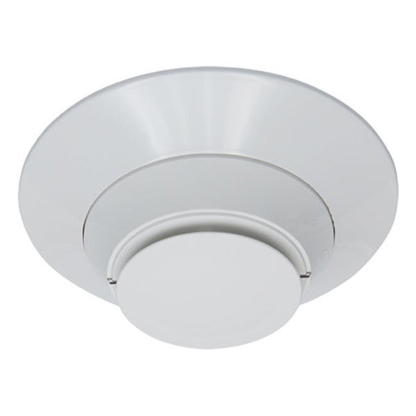 A white, ceiling-mounted Gamewell-FCI photoelectric smoke detector with a contemporary design.
