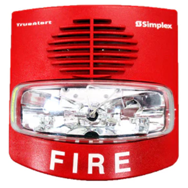 A red Simplex TrueAlert fire alarm with a horn and strobe light, featuring the word 'FIRE' printed on the front.